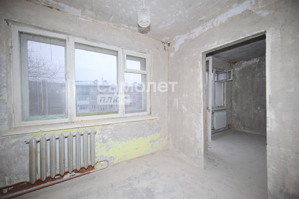 
  Продается 4-комн. квартира, 61.4 м², Строителей б-р, д. 25б
. Фото 9.