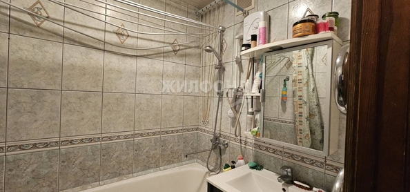 
   Продам 4-комнатную, 77.3 м², В. Высоцкого ул, 13

. Фото 10.